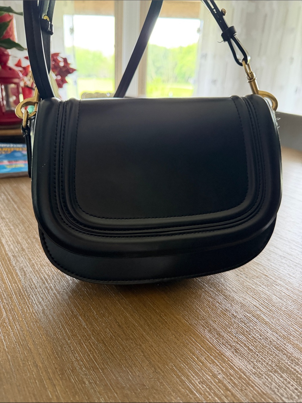 Zara Black Curved Saddle Crossbody with Gold Hardware